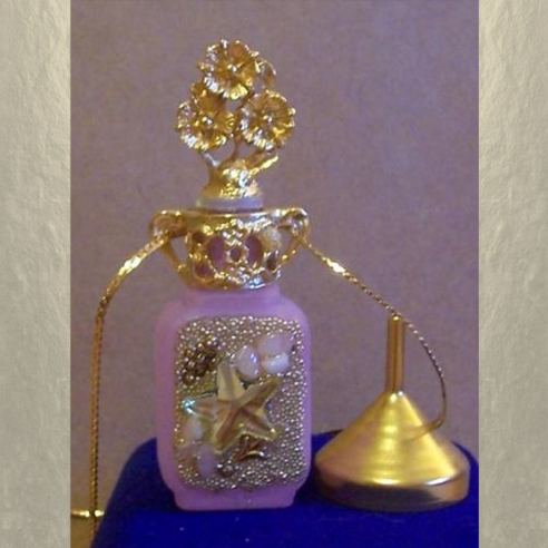 Collier fiole à parfum plaqué or dans écrin modèle 35  - 1