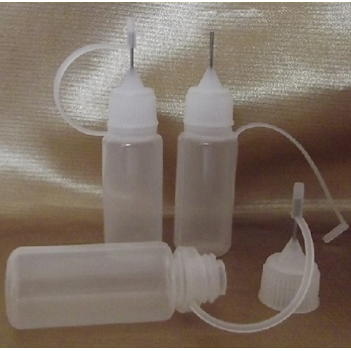Bouteille- flacon avec aiguille de remplissage vide et rechargeable pour bijoux diffuseurs de parfum,  - 1