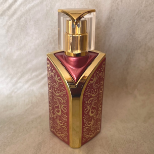 Vaporisateur de parfum buste motif cachemire bordeaux perlé