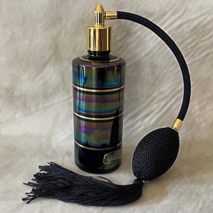 Vaporisateur de parfum vide et rechargeable irisé fond noir