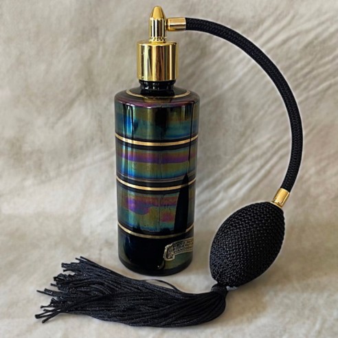 Vaporisateur de parfum poire vide et rechargeable irisé fond noir