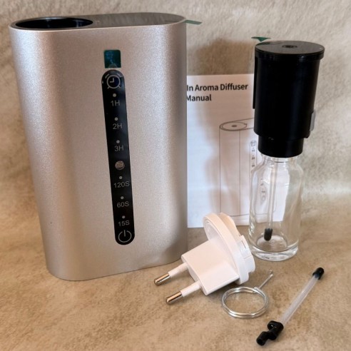 Diffuseur de parfum prise automatique programmable plus 30 ml de concentré de parfum pur offert