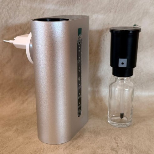Diffuseur de parfum prise intelligent programmable plus 30 ml de concentré de parfum pur offert profil